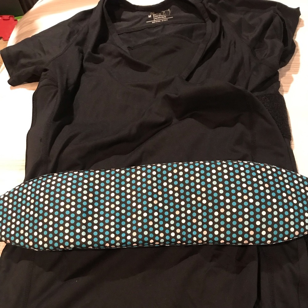 Nuroo Pocket baby wearing short sleeved shirt